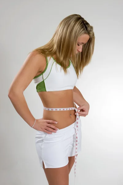Mujer midiendo cintura —  Fotos de Stock