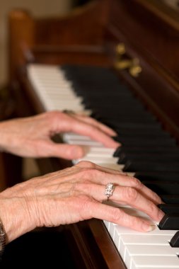 Old Hands Playing Piano clipart