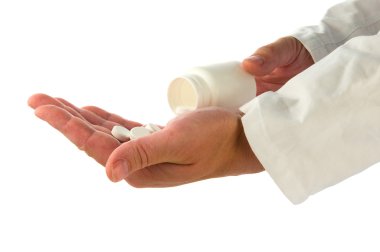 Doctor hands with pills clipart