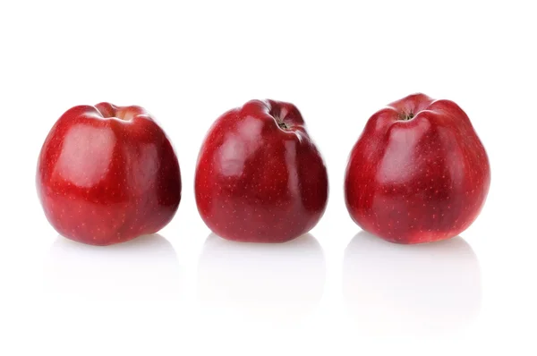 Three red apples with reflection — Stock Photo, Image