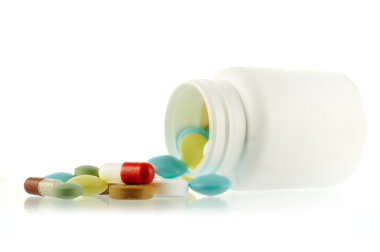 Bottle with falling out pills clipart
