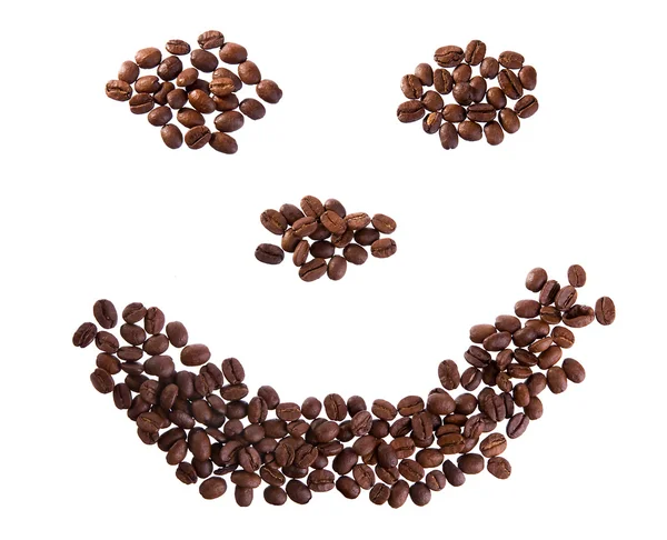 Úsměv s kávová zrna — Stock fotografie