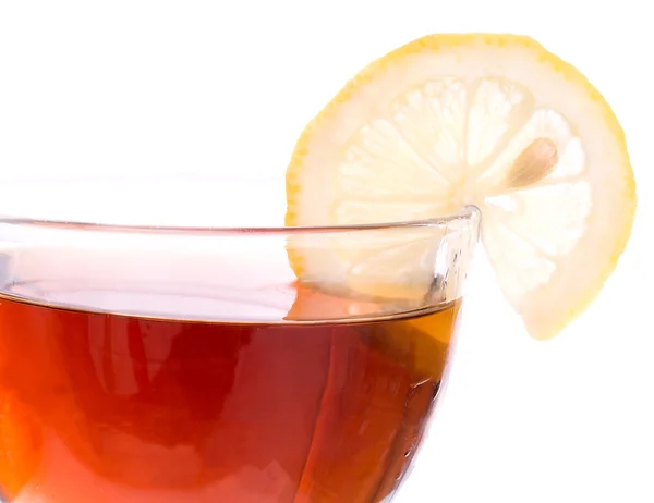 Brädden av kopp med te och citron — Stockfoto