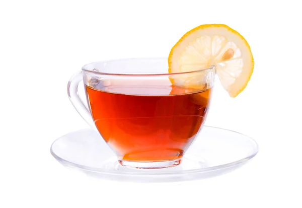 Copo com chá e limão segmento — Fotografia de Stock