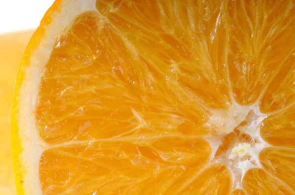 Juicy orange slice very close-up — Stok Foto
