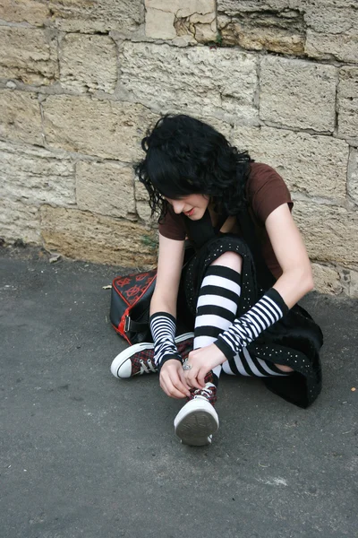 Girl tie up her laces — Stock Photo, Image