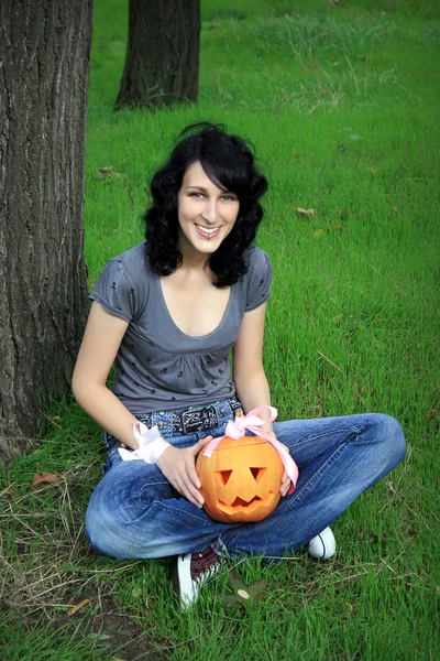 Happy teen with pumpkin — Stock Photo, Image