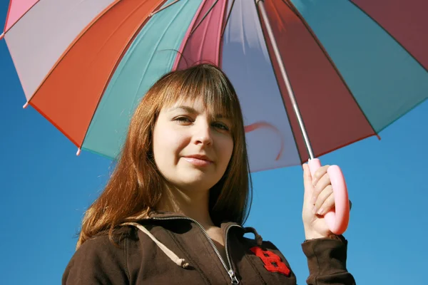 Under colored umbrella — Stock Photo, Image