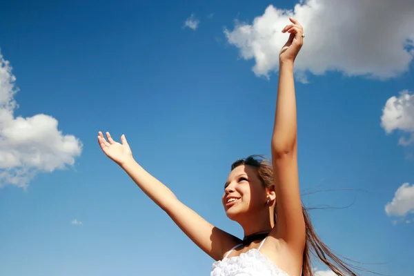 Girl dancing with clouds — Stock Photo, Image