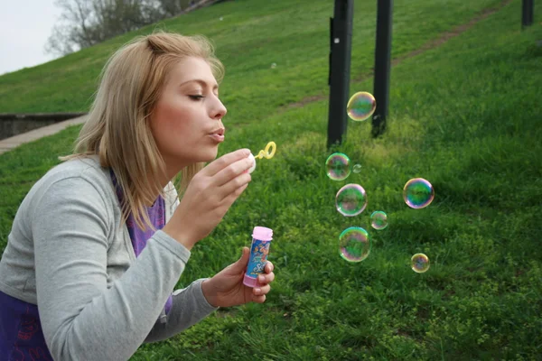 Spring girl with bubbles — Stock Photo, Image