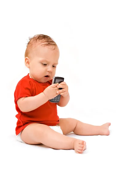 Picture of baby in diaper with cell phon Stock Photo