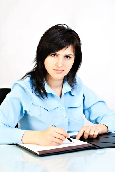 Businesswoman writing. — Stock Photo, Image