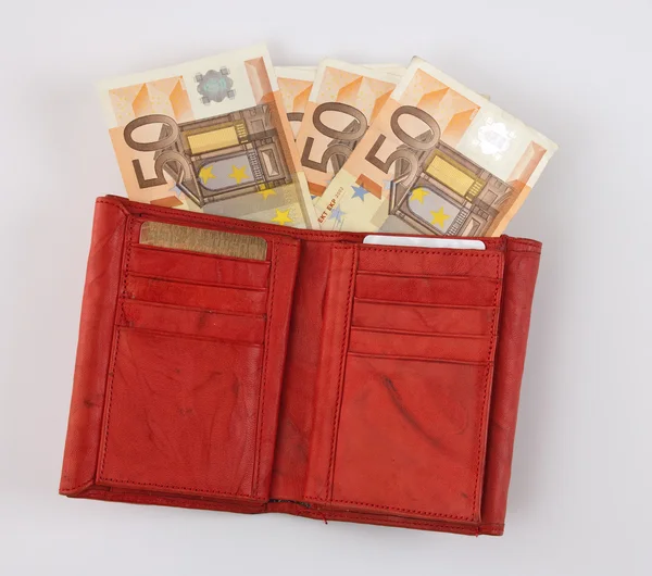 Billetera roja con billetes en euros — Foto de Stock