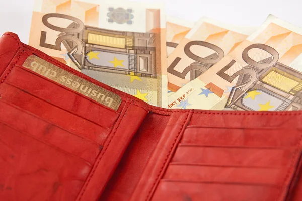 Carteira vermelha com notas de euro — Fotografia de Stock