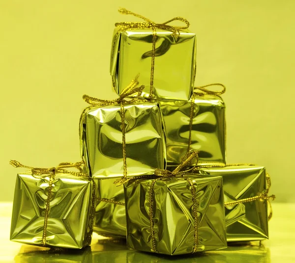 Golden gift boxes — Stok fotoğraf