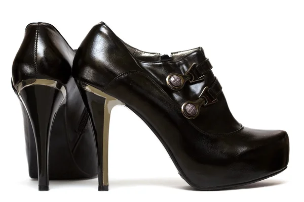 Sapatos femininos pretos isolados — Fotografia de Stock