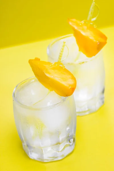 Beverage with ice and peach — Stock Photo, Image