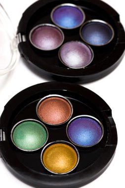 Varicoloured make-up eye-shadows clipart