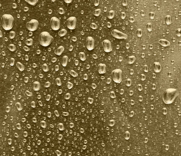 Gyllene vattendroppar — Stockfoto