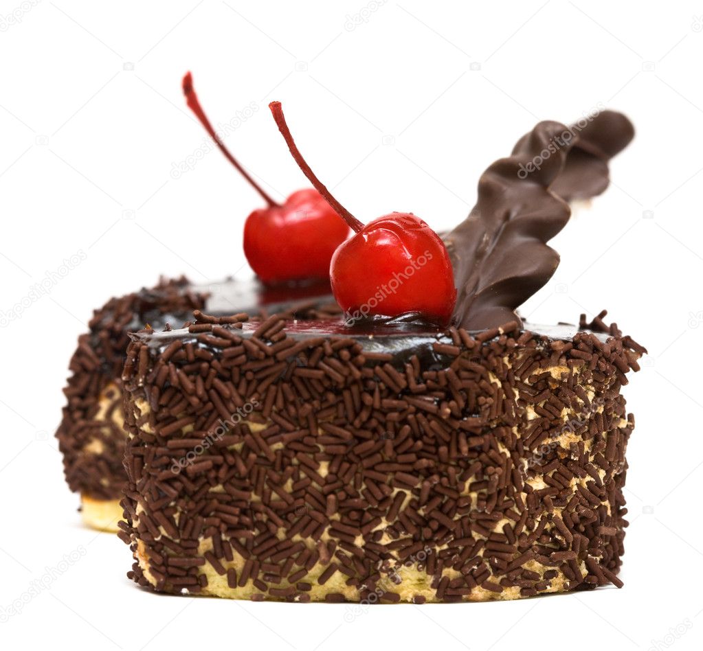 Chocolate cakes with red cherry