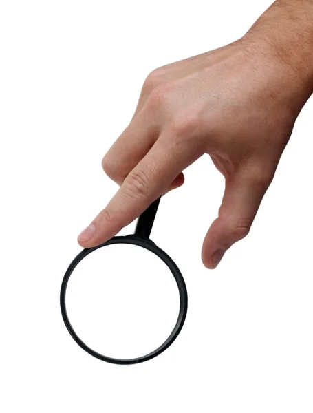 Magnifier in human hand — Stock Photo, Image