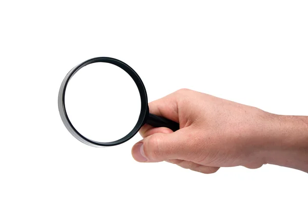 Hand holding magnifying glass — Stock Photo, Image
