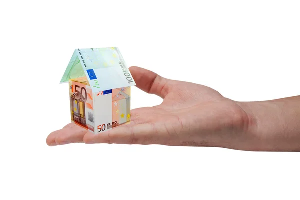 Ett hus gjort från euro räkningar å — Stockfoto