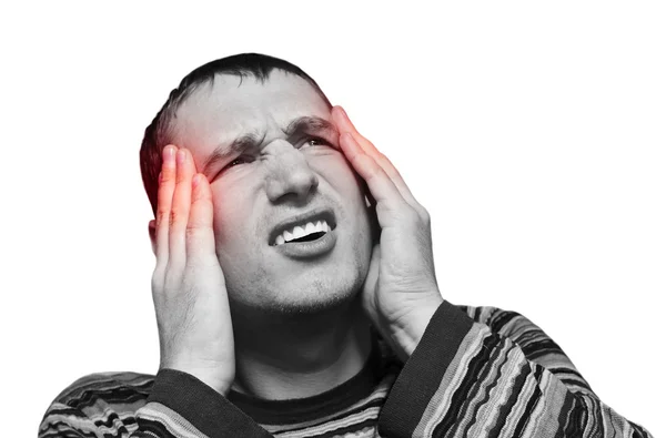 Mladý muž trpí bolestí hlavy — Stock fotografie