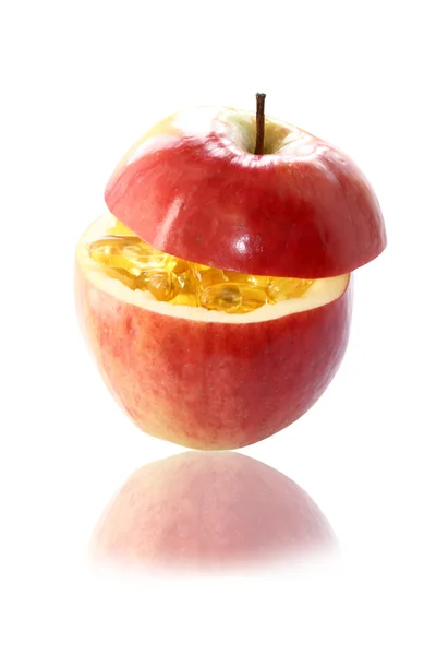 Jabłko z witamin wewnątrz — Zdjęcie stockowe