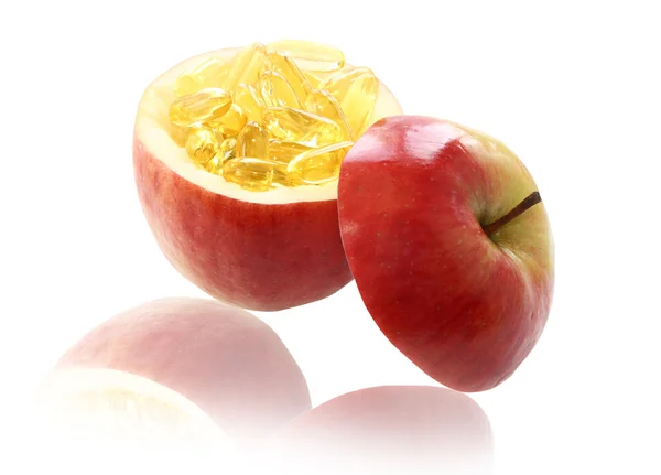 Jablko s vitamíny uvnitř — Stock fotografie