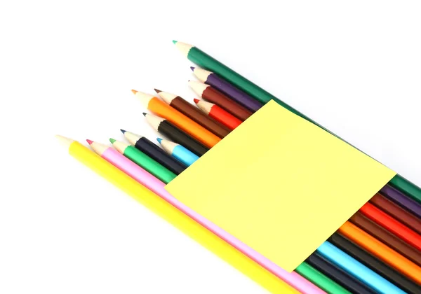 ISO çok renkli kalemler ve notu sopa — Stok fotoğraf