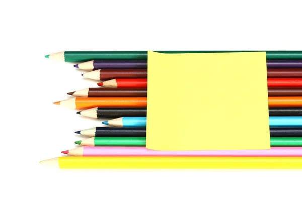 Multicolored pencils and note stick iso — Stock Photo, Image
