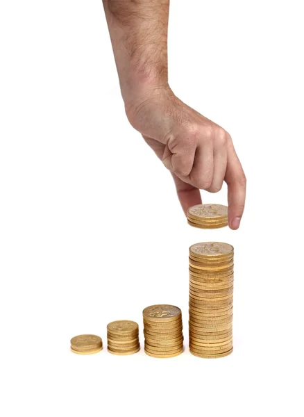 Hand put coin to money staircase — Stock Photo, Image