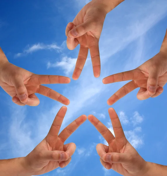 Star made of human hands — Stock Photo © blackan #2392111