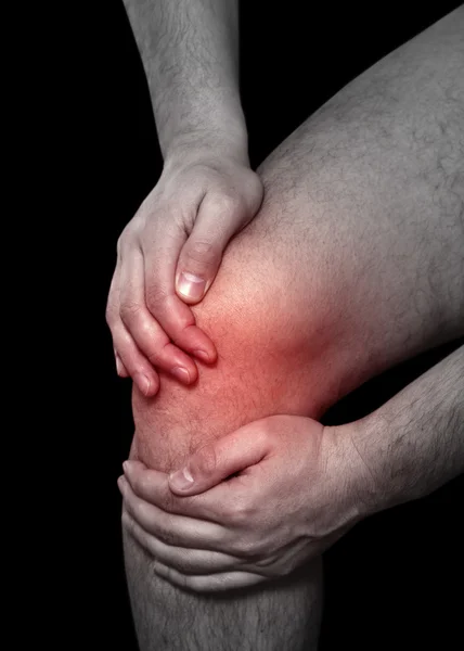 Болі в колінах — стокове фото