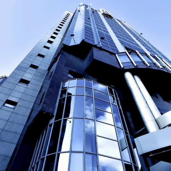 Illuminated modern building skyscraper — Stock Photo, Image