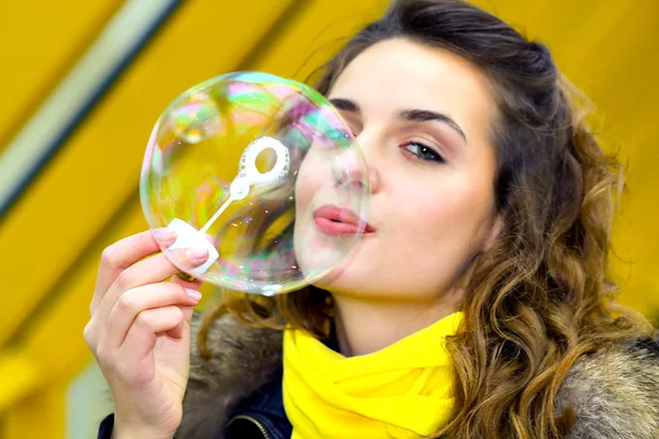 Smile teen blowing soap bubbles — Stock Photo, Image