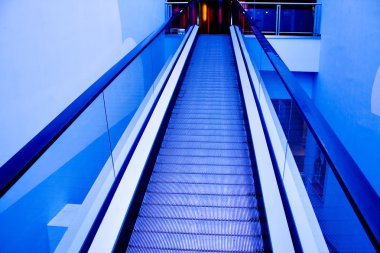 Blue moving escalator clipart