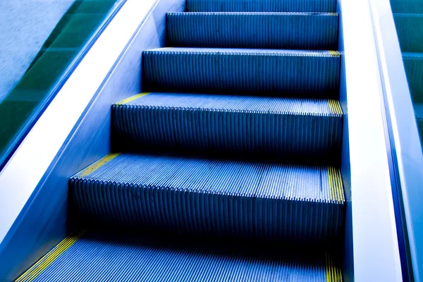 Moving escalator in the office hall — Stock Photo, Image