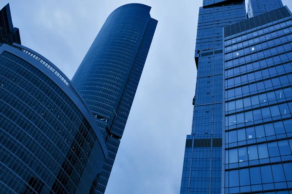 Business skyscrapers in the evening — Stock Photo, Image