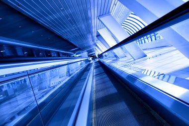 Fast moving escalator by motion clipart