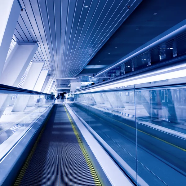 Fast moving escalator by motion — Zdjęcie stockowe