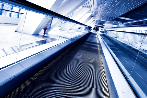 Fast moving escalator by motion — Zdjęcie stockowe