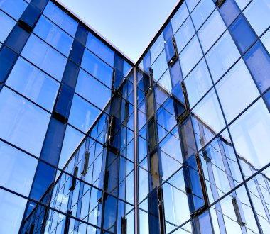 Abstract glass side of business building clipart