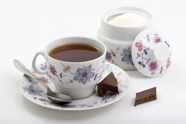 Eine Tasse Tee und Schokolade — Stockfoto