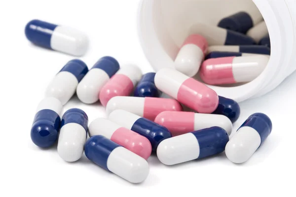 Comprimidos de cápsula azul e rosa — Fotografia de Stock