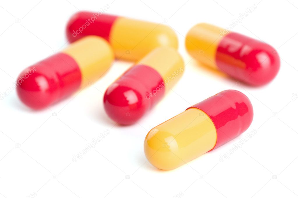 Red and yellow capsule pills isolated — Stock Photo © duskbabe #1419321