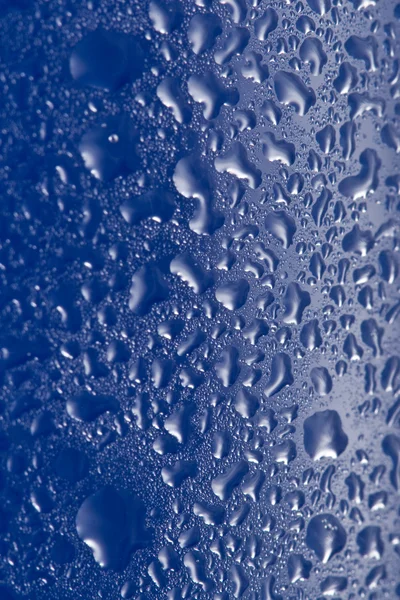 Water drops on blue glass — Stock Photo, Image