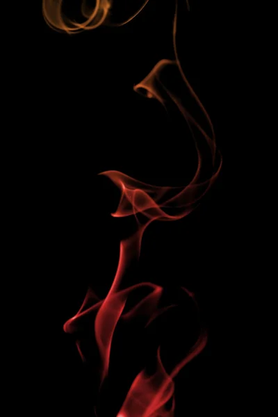 Червоний дим ізольований на чорному — стокове фото