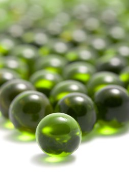 Macro of green capsule pills clipart